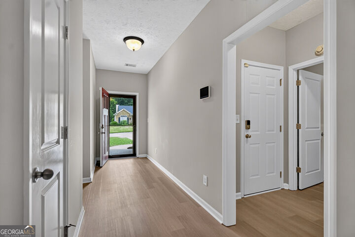 Property Photo: 402 Creekside Drive GA 30240
