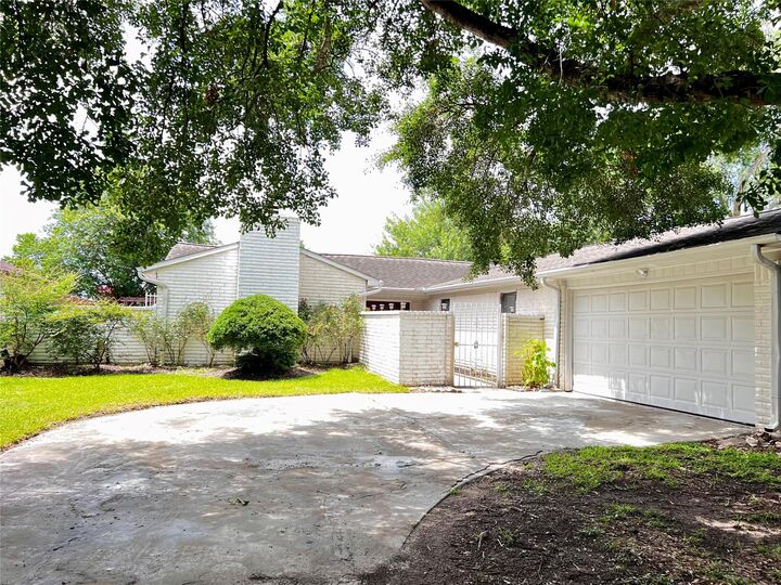 Property Photo: 13819 Wickersham Lane TX 77077