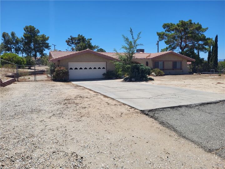 Property Photo:  19235 Tonkawan  CA 92307 