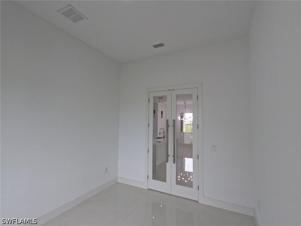 Property Photo:  2423 NW 6th Street  FL 33993 