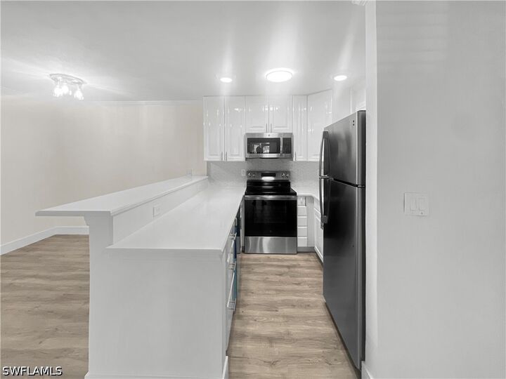 Property Photo:  766 Central Avenue 113  FL 34102 