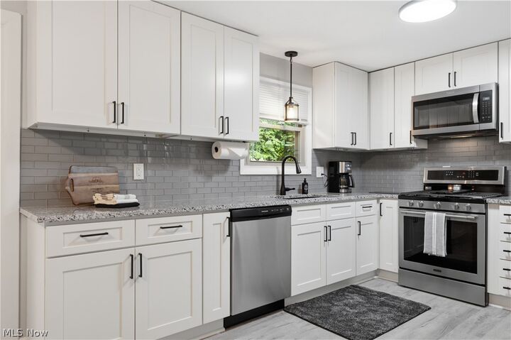 Property Photo:  8173 Spencer Avenue NW  OH 44720 