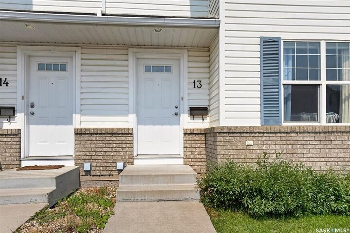 Property Photo:  102 Pawlychenko Lane 13  SK S7V 1G9 