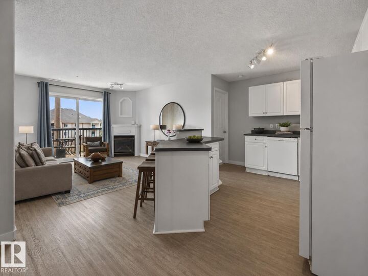 Property Photo: 16303 95 Street NW 319 AB T5Z 3V1