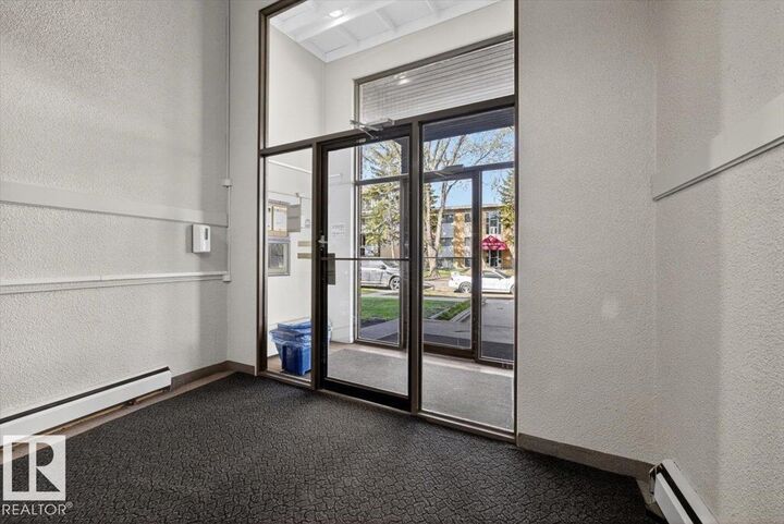 Property Photo: 10335 117 Street NW 301 AB T5K 1X9