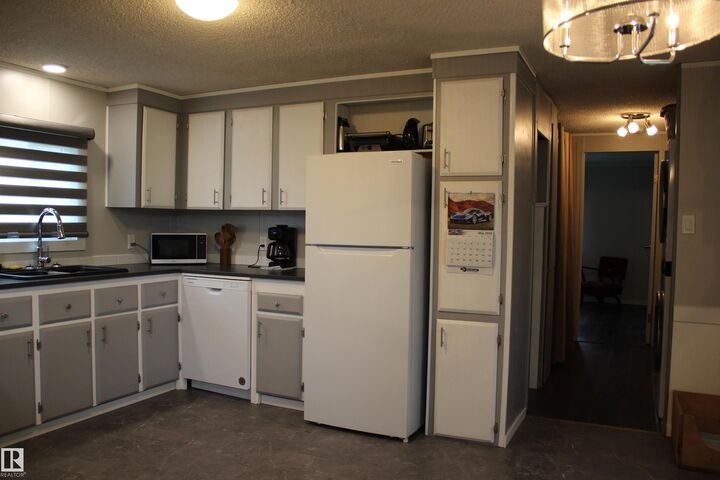 Property Photo:  1118 Lakevista Drive  AB T8H 1J6 