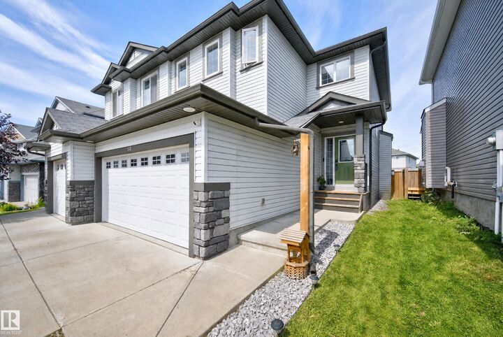Property Photo: 58 Woodbridge Link AB T8L 0H8