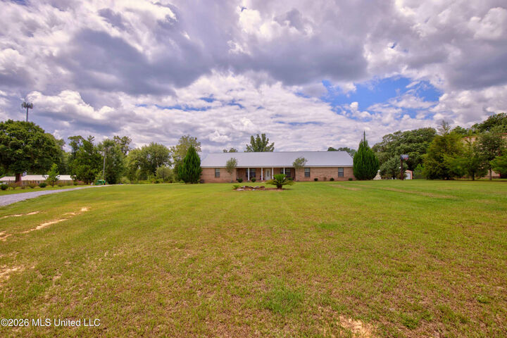 Property Photo:  13163 US-98  MS 39452 