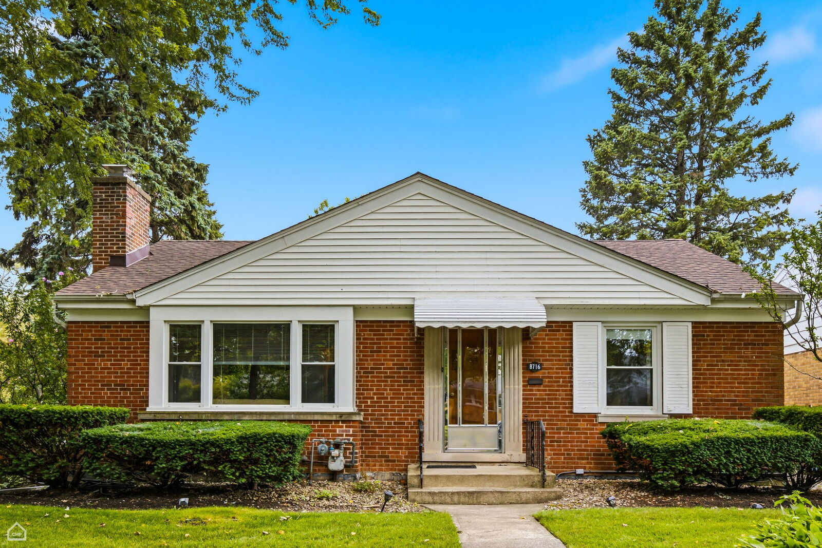 Property Photo: 8716 N Harding Avenue IL 60076