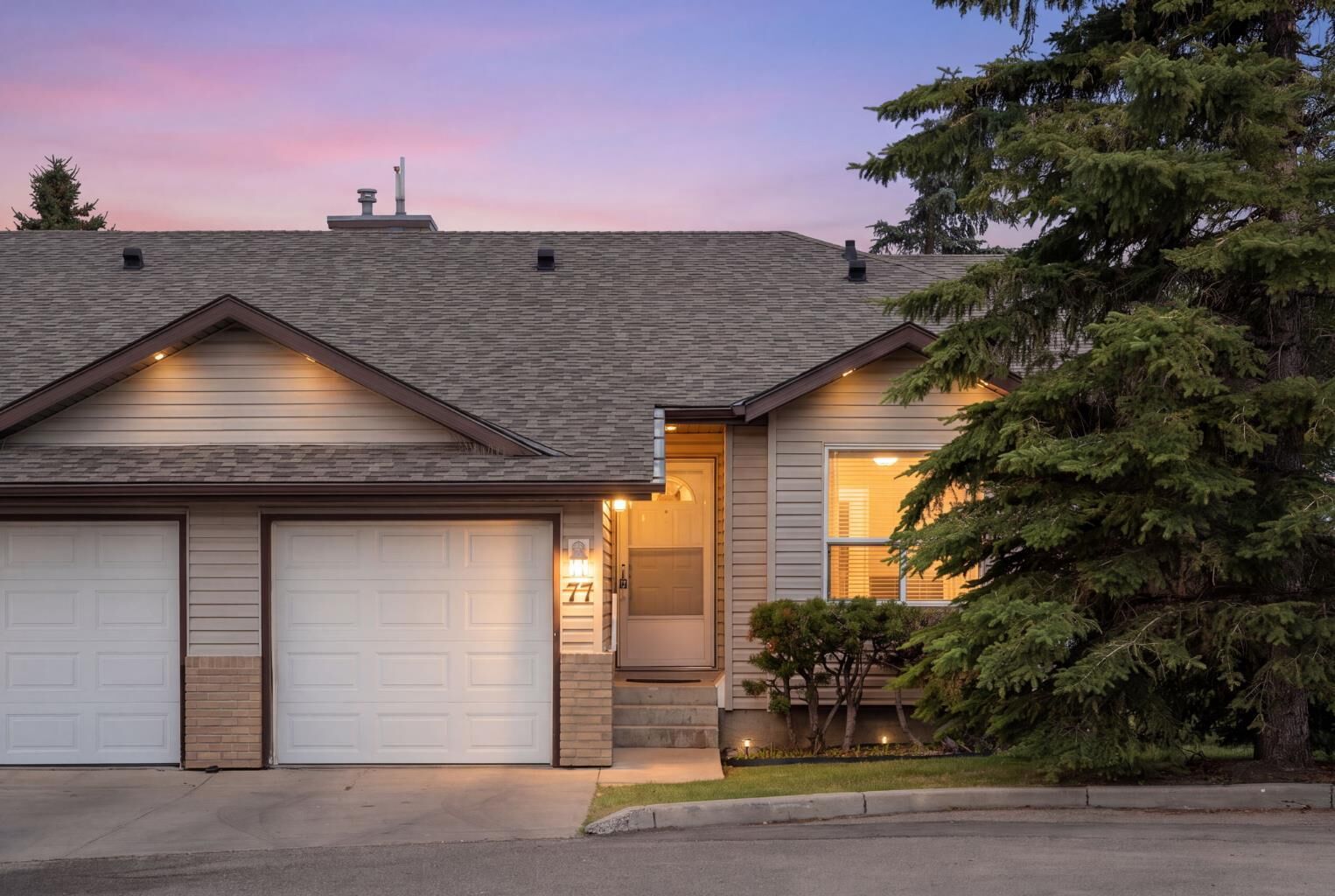Property Photo:  77 Tararidge Circle NE  AB T3J 3W4 