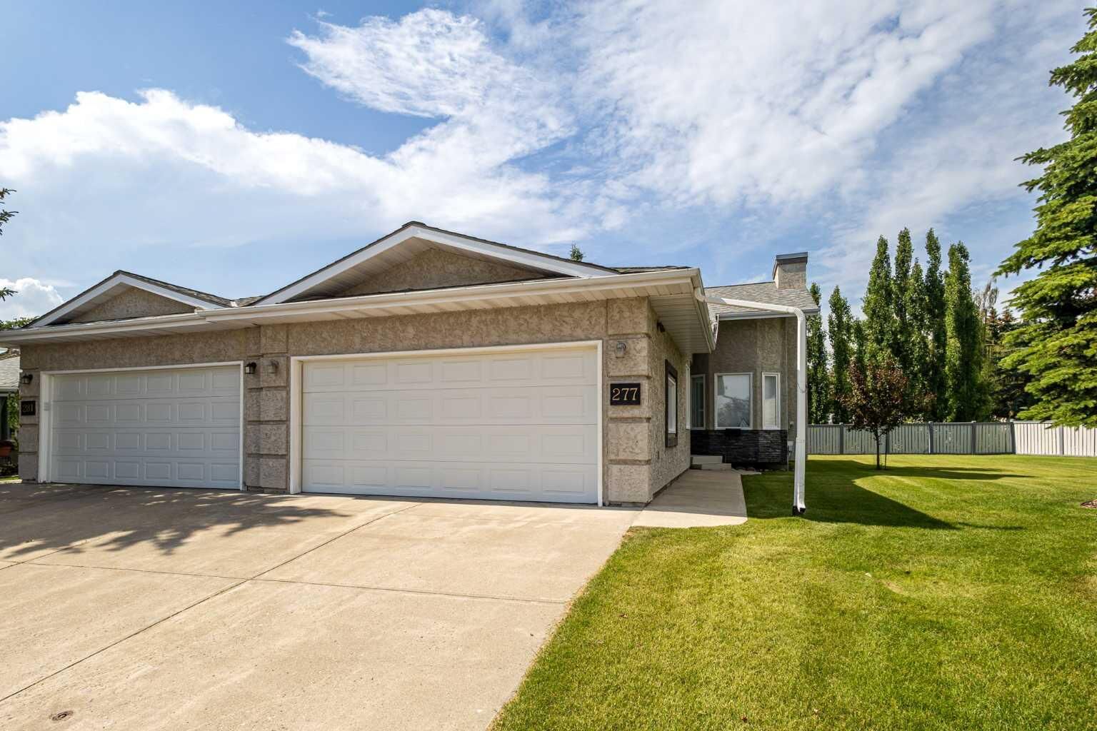 Property Photo: 277 Arbour Cliff Close NW AB T3G 3W8