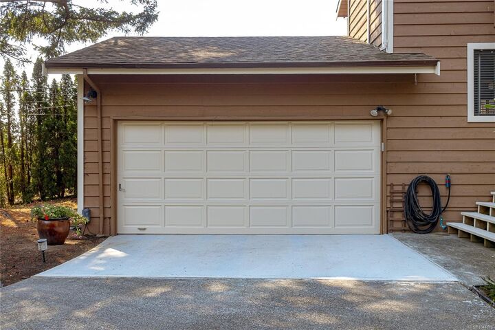 Property Photo: 7318 Veyaness Rd BC V8M 1M3