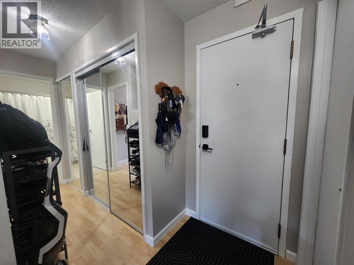 Property Photo: 3033 Ospika Boulevard 202 BC V2N 4L5