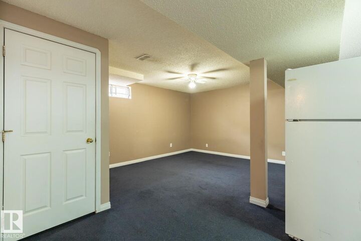 Property Photo: 1035 Lakewood Road NW AB T6K 3B1