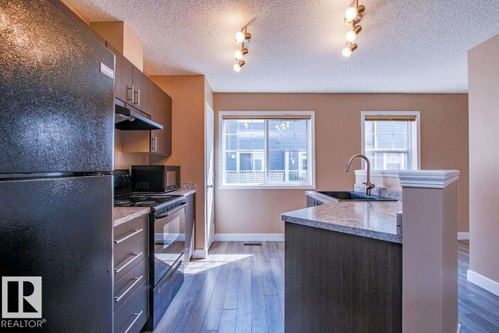 8304 11 Avenue SW 15 — photo 1