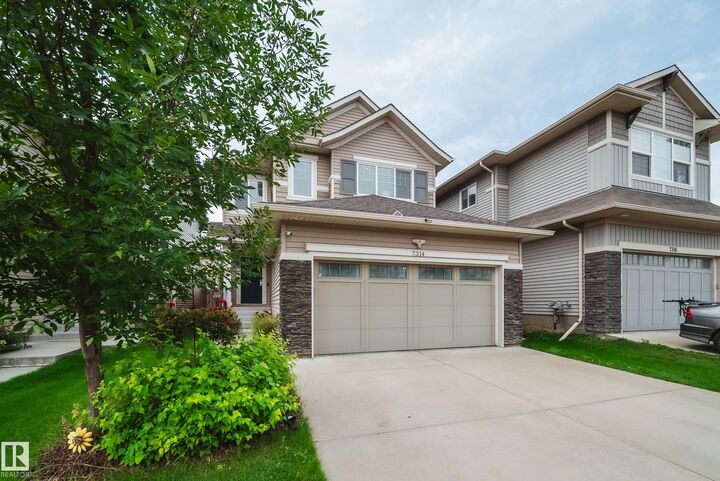 Property Photo: 7314 Edgemont Way NW AB T6M 0S1