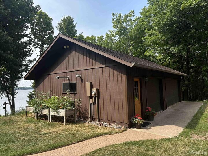 Property Photo:  8997 N East Shore Road  MI 49947 