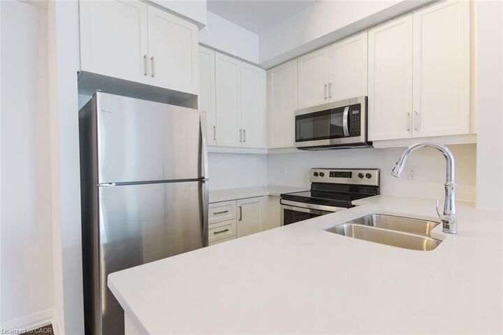 Property Photo: 155 Caroline Street S 1002 ON N2L 0J8