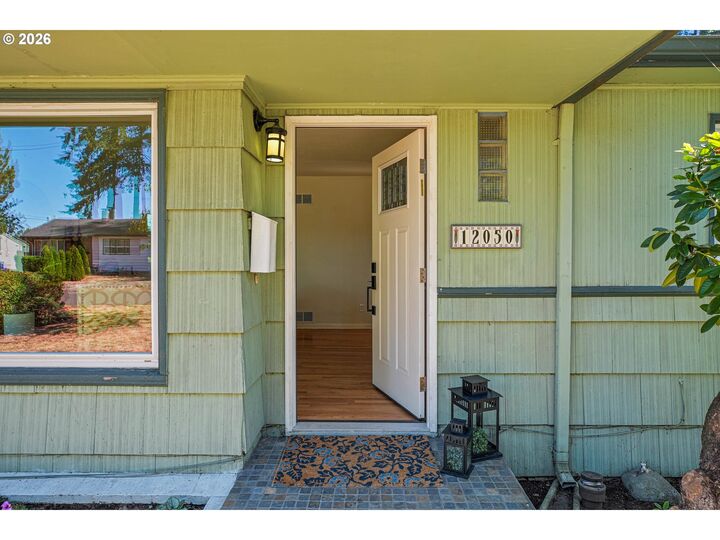 Property Photo:  12050 NE Broadway  OR 97220 
