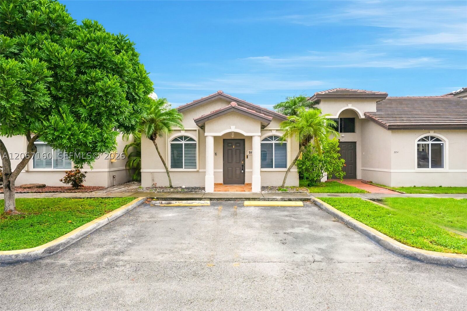 Property Photo:  18751 NW 84th Pl 505-5  FL 33015 