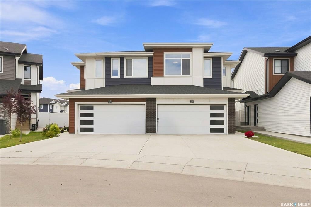 Property Photo:  422 Myles Heidt Manor  SK S7W 1J1 