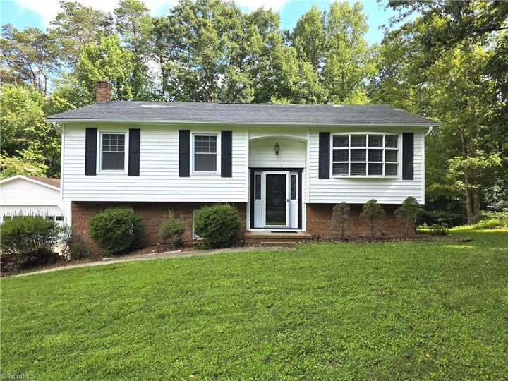 Property Photo:  414 Oak Ridge Drive  NC 27030 