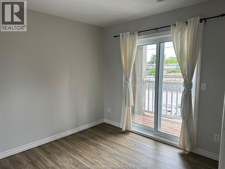Property Photo:  809 Erie Street East 3  ON N9A 3Y5 
