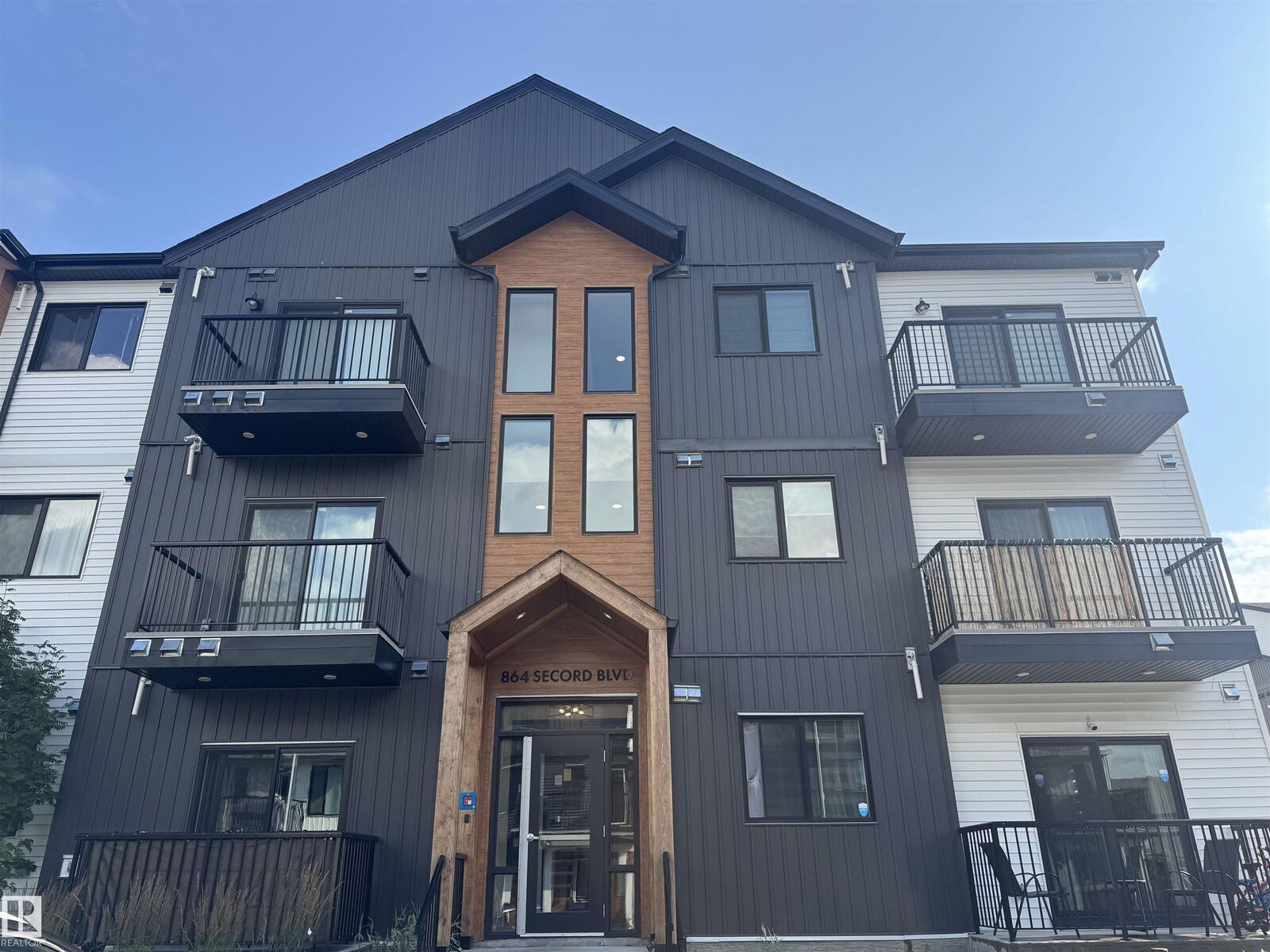 Property Photo: 864 Secord Boulevard NW 301 AB T5T 7R9