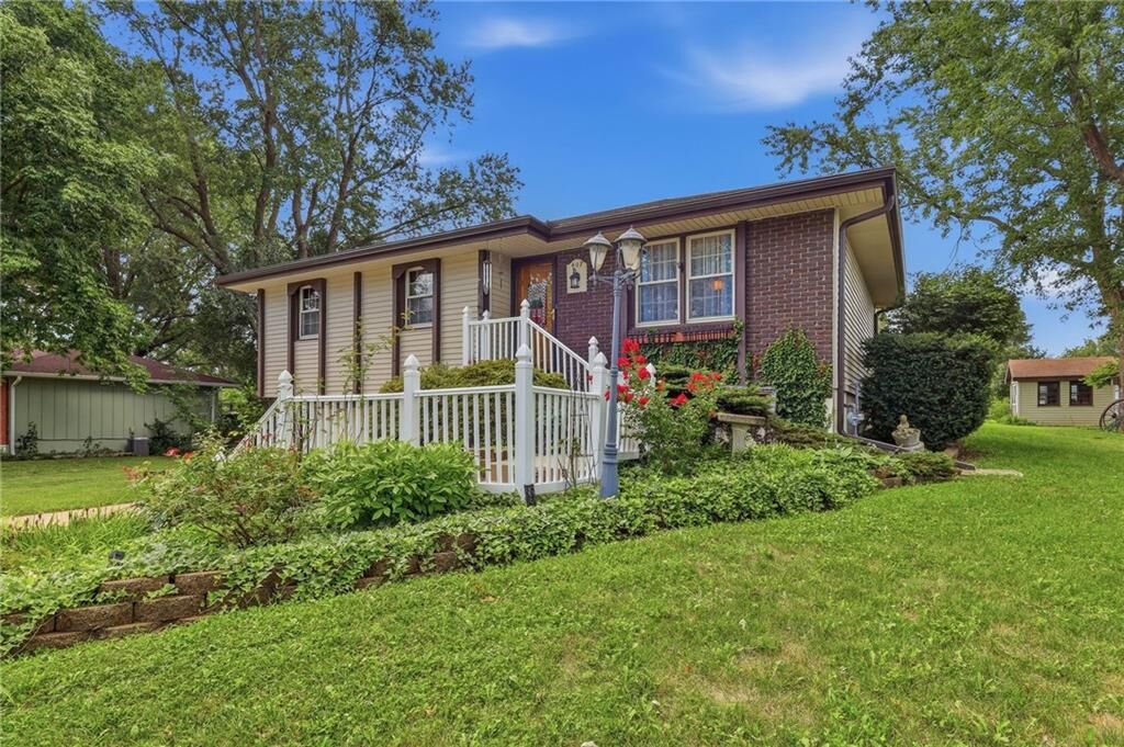 Property Photo:  407 NE 113th Street  MO 64155 