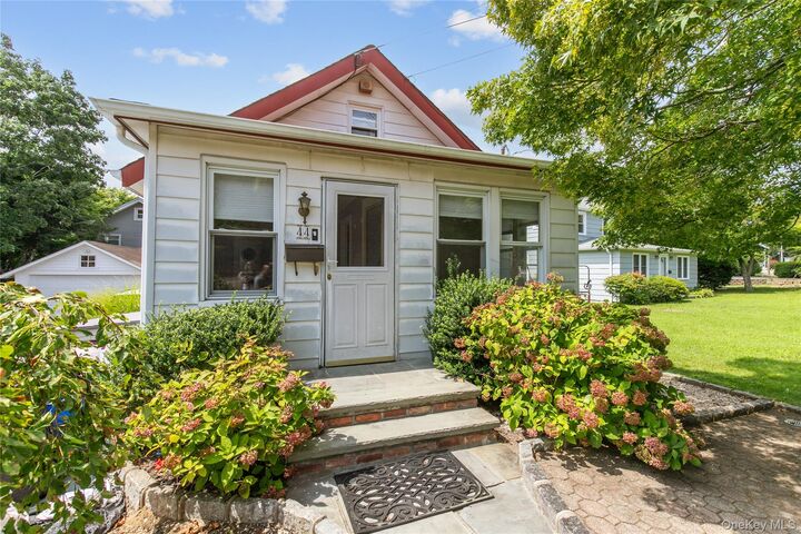 Property Photo:  44 Perry Avenue  NY 11709 