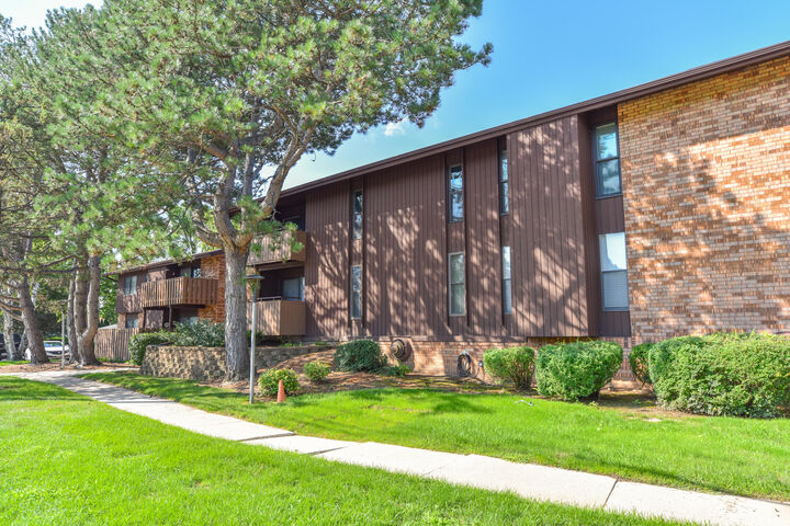 Property Photo:  7001 N Green Bay Ave  WI 53209 
