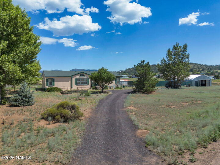 Property Photo: 7685 N Creekside Drive AZ 86004