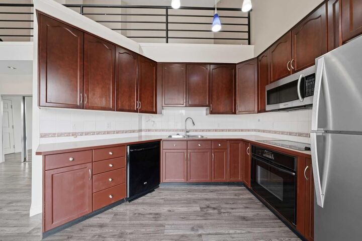 Property Photo: 6550 Old Banff Coach Road SW 114 AB T3H 4J4