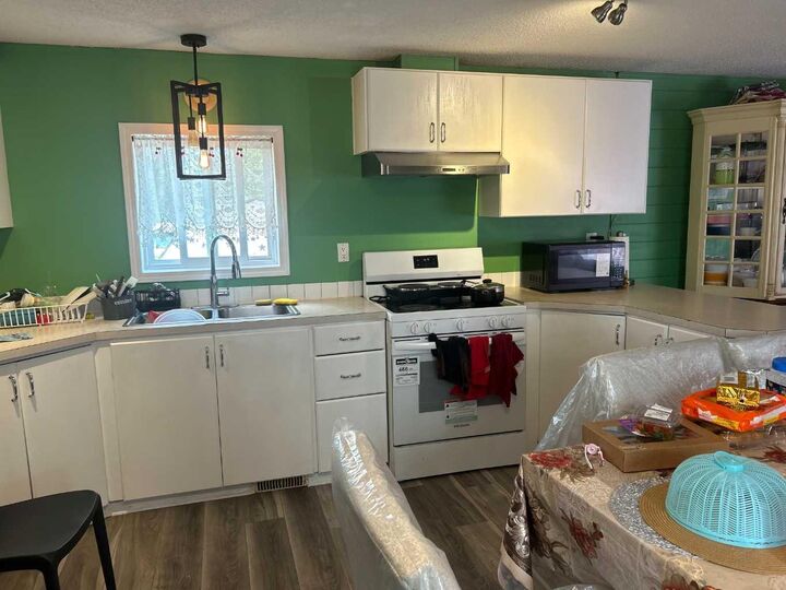 Property Photo: 116 Meadow Lake Close E AB T1R 1G1