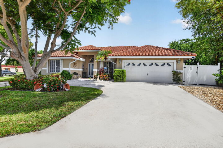 Property Photo: 703 Avocet Road FL 33444