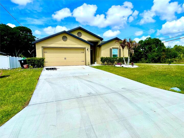 Property Photo:  3902 SW Brunswick St  FL 34953 