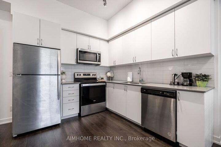 Property Photo: 56 Lakeside Terrace 1203 ON L4M 0L4