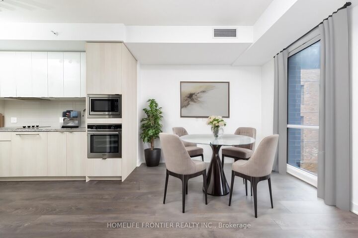 Property Photo: 115 Blue Jays Way 705 ON M5V 0N4