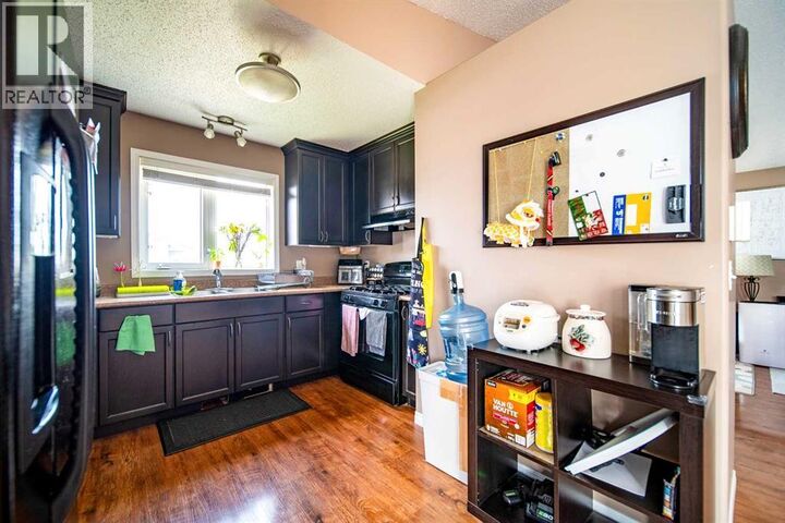 Property Photo:  1025 30 Street  AB T9W 0A8 