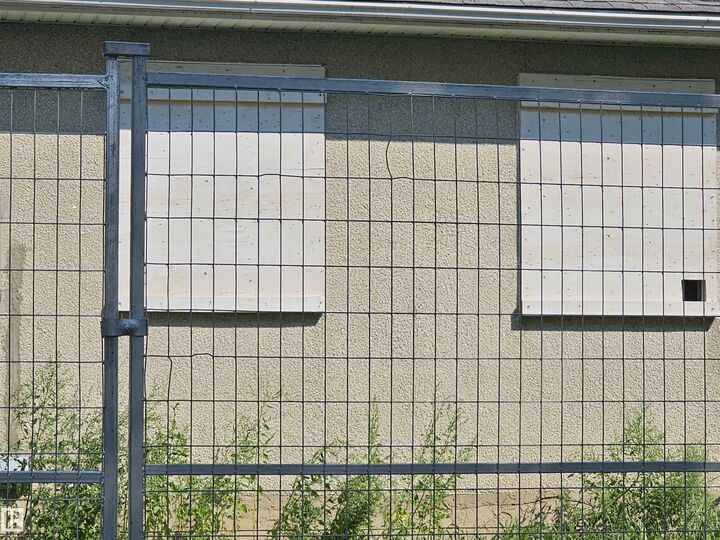 Property Photo:  9115 76 St NW  AB T6C 2K4 
