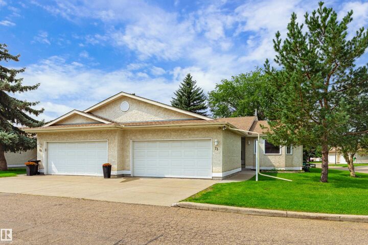 Property Photo: 9375 172 Street NW 21 AB T5T 3C3