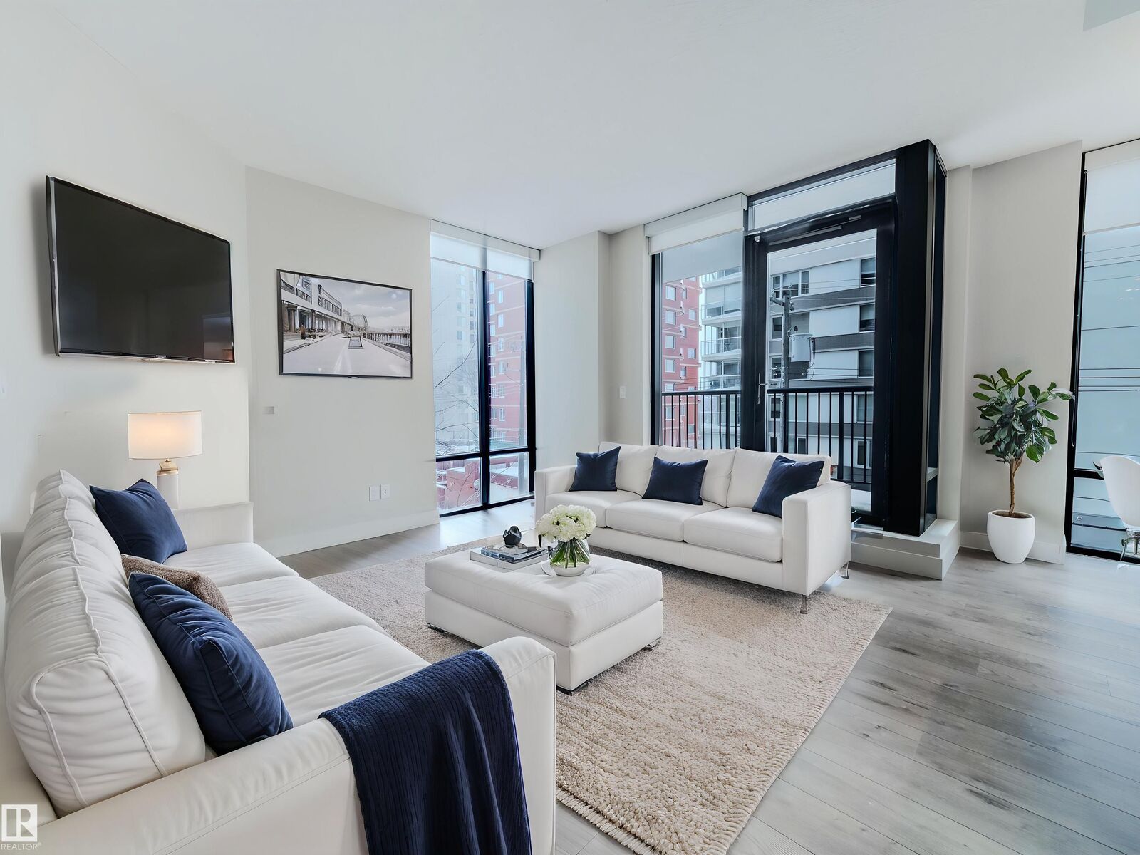 Property Photo: 11933 Jasper Avenue NW 304 AB T5K 0P1