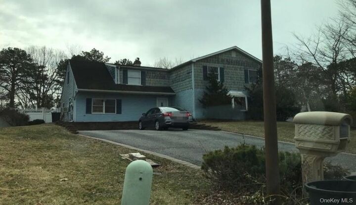 Property Photo:  5 Norway Pine Drive  NY 11763 