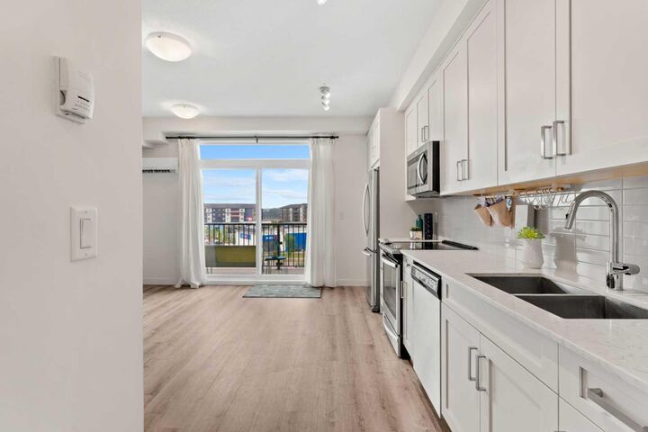 Property Photo:  20 Walgrove  SE 408  AB T2X 4L2 
