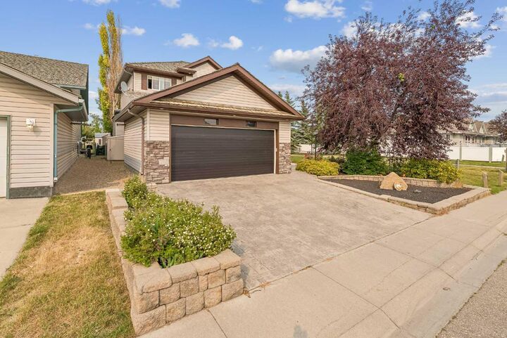 Property Photo: 1116 Woodside Way NW AB T4B 2S3
