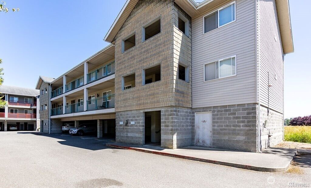 Property Photo:  9735  272nd Place NW 510  WA 98292 