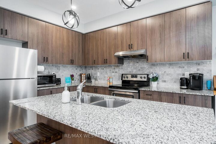 Property Photo: 171 Snowbridge Way 37 ON L9Y 0V1