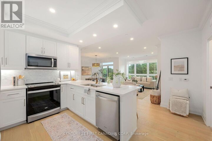 Property Photo: 1975 Fountain Grass Drive 206 ON N6K 0M3