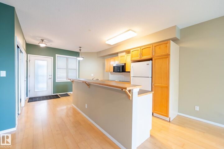 Property Photo:  11039 83 Avenue NW 412  AB T6G 2V6 