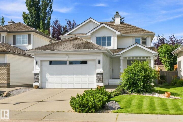 Property Photo: 1312 116 Street NW AB T6J 7B3